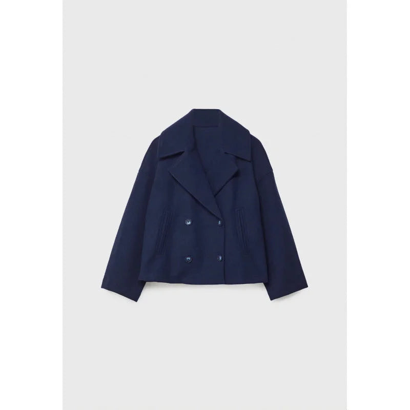 Blue women's double breasted lapel blazer with notched collar and pocket detail