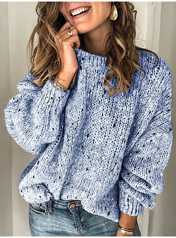 Blue women’s polka-dot knitted sweater displayed in a comfy casual style