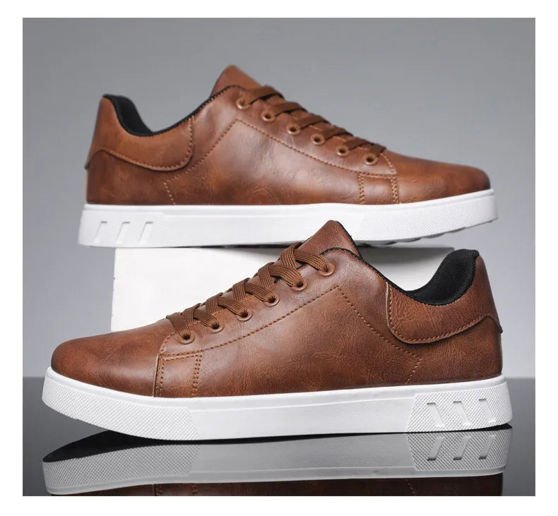 Brown leather sneakers mens fashion detail showing stitching and laces