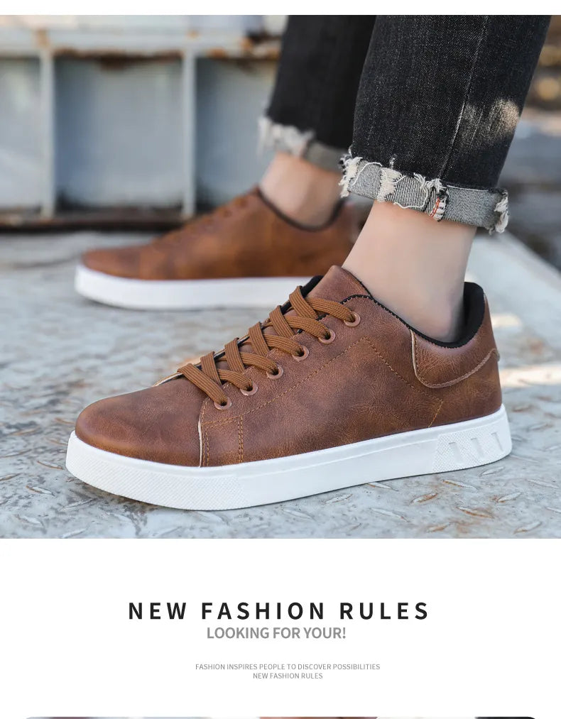 Brown leather sneakers worn with jeans on a concrete surface, with text 'NEW FASHION RULES LOOKING FOR YOUR!'.