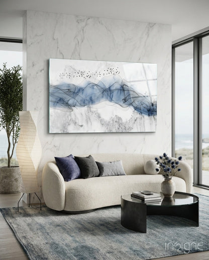 Cobalt ink drift glass wall art, blue ink wisp and scattering birds on marble