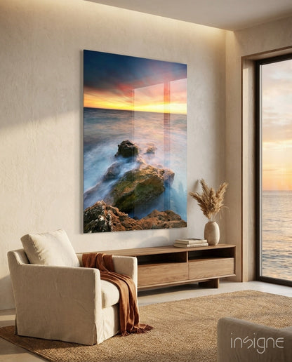 Sea boulder sunset glass wall art in peach and cobalt
