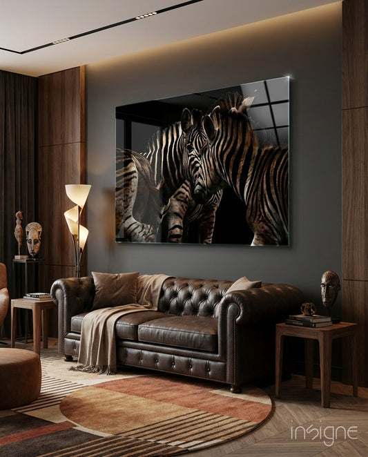Two zebras in warm sepia against shadow, glass wall art