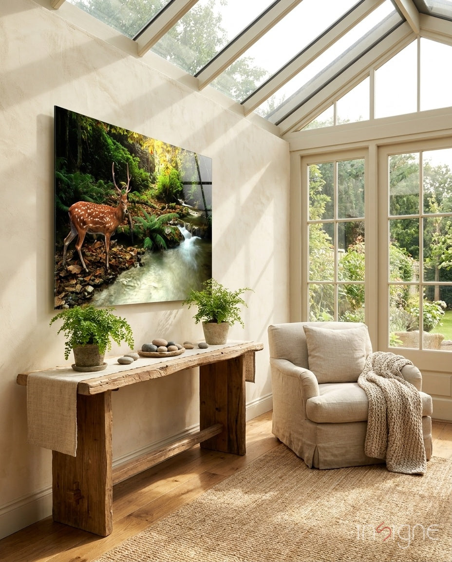 Spotted deer beside a forest stream on glass wall art