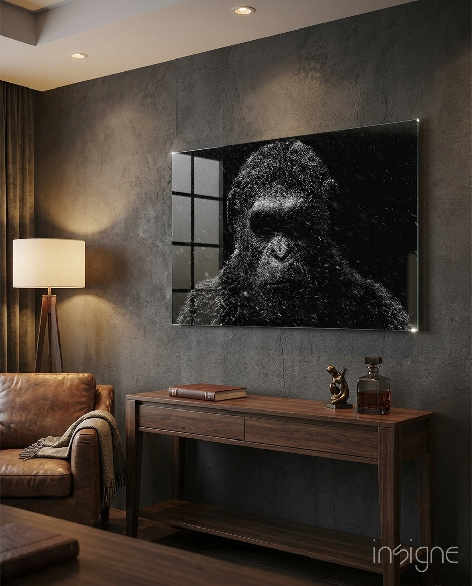 Gorilla dusted with snow against black, moody glass wall art