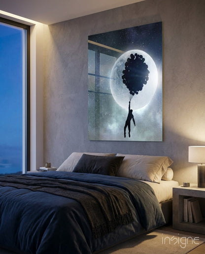 Man floating on balloons glass wall art