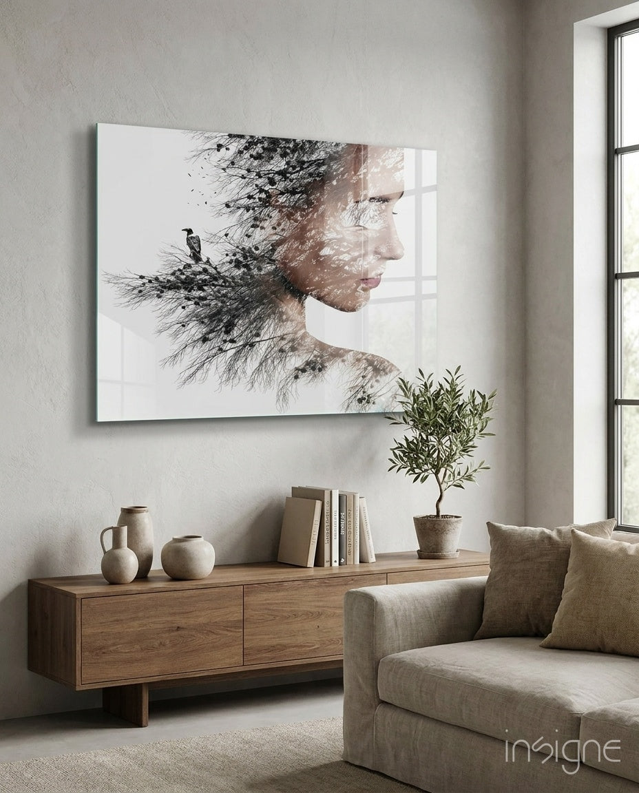 Woman bird double exposure glass wall art - woman profile dissolves into bird and branches, monochrome