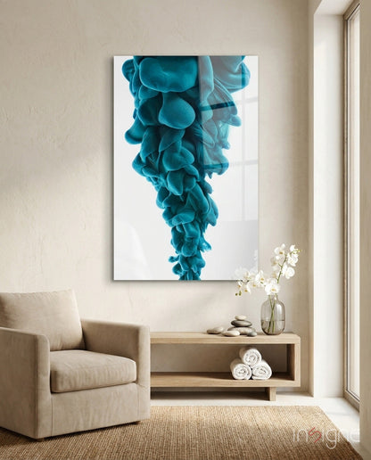 Blue Layers glass wall art featuring a teal fluid ink cloud design