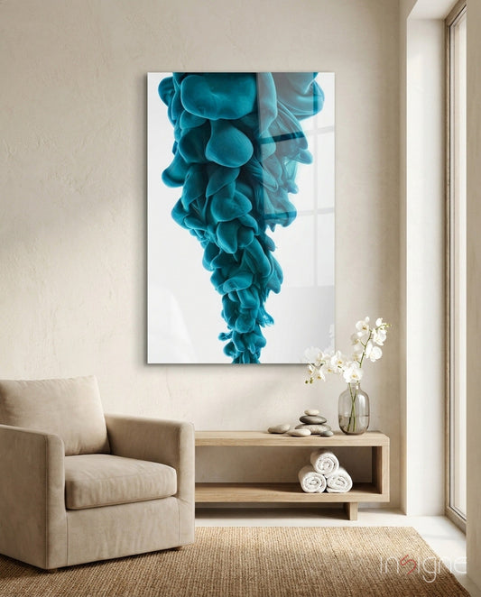 Blue Layers glass wall art featuring a teal fluid ink cloud design