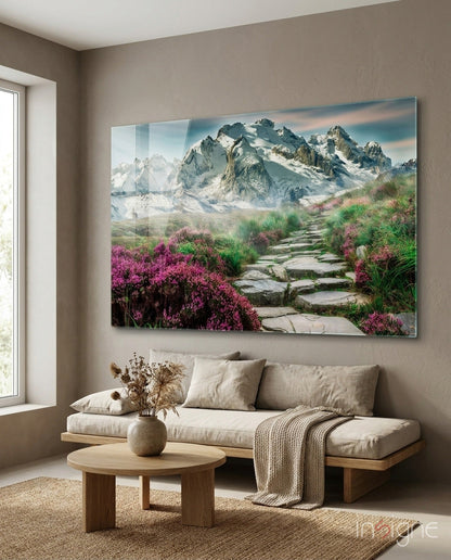 Stone footpath through heather to snowy mountain peaks glass wall art