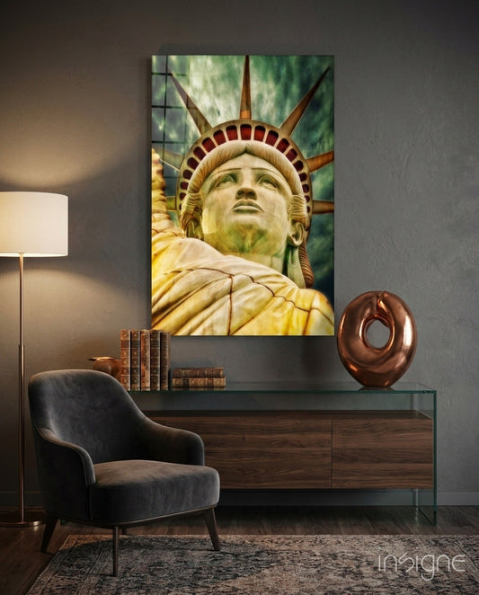 Statue of Liberty glass wall art hanging in a living room
