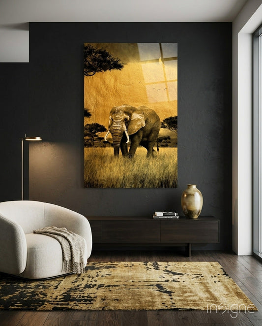 Bull elephant on golden savanna under acacia silhouette, glass wall art safari scene