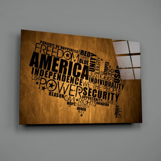 Patriotic word USA map glass wall art on a gray wall with a window reflection across the glossy glass