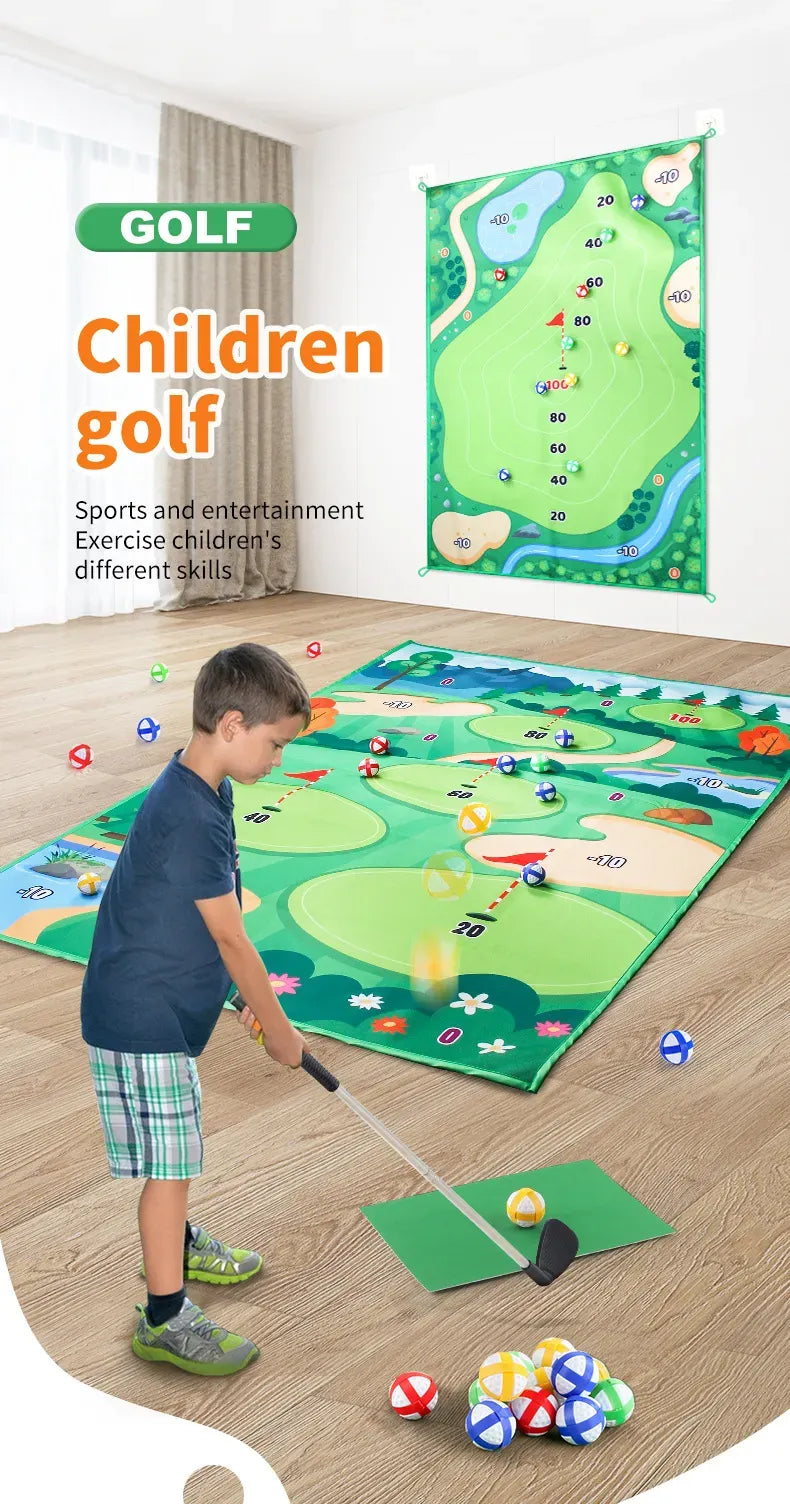 Child playing with a golf set on a large green mat resembling a golf course.