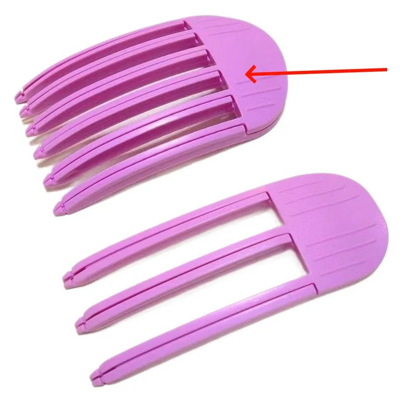 Close-up of pink plastic hair root volume clips featuring curved comb teeth design for crown lifting