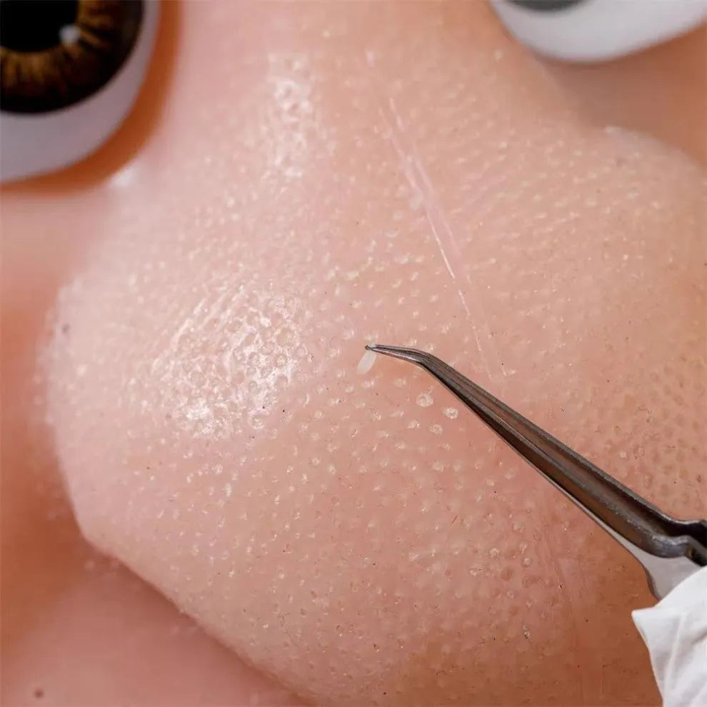 Close-up of pores on silicone pimple popping head