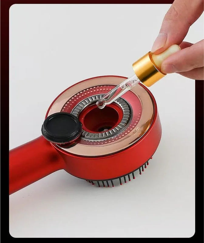 Close-up of the red scalp massager being filled with essential oil through the top reservoir.