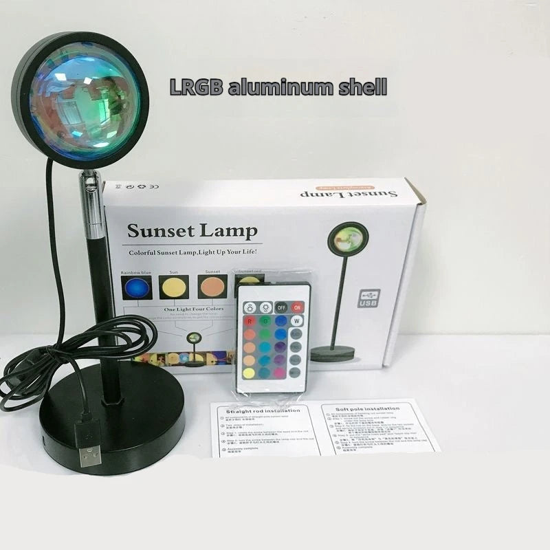 Colorful sunset lamp with remote control and packaging on a white background