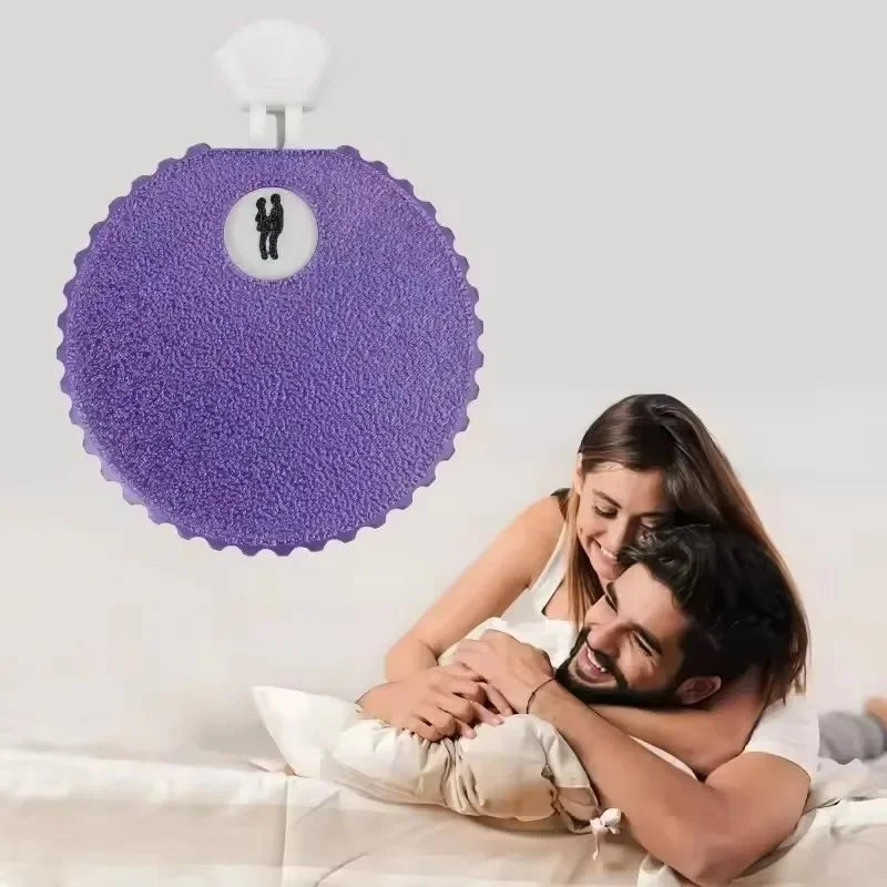 Couple playing position selector roulette spinner game together on bed