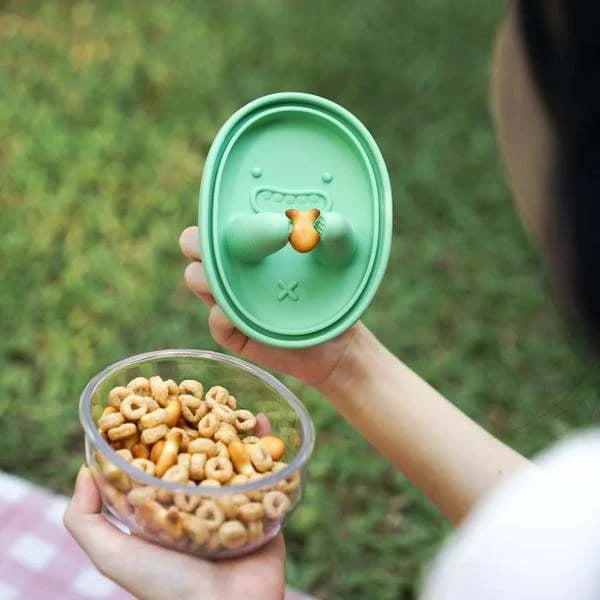 Cute snack container with smiley face lid in blue for portion control