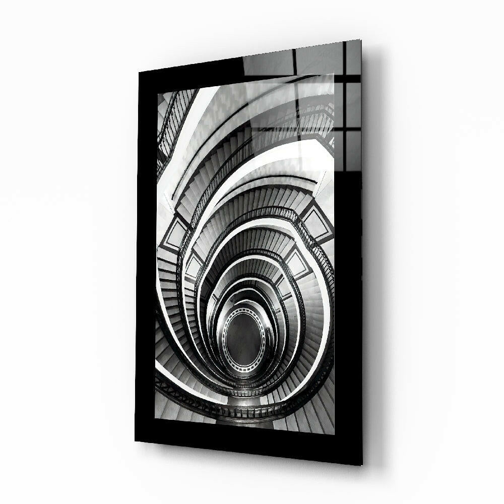 Black and white spiral staircase glass wall art aerial photo