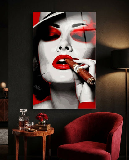 Red lips cigar woman glass wall art above a decanter table and a red velvet armchair