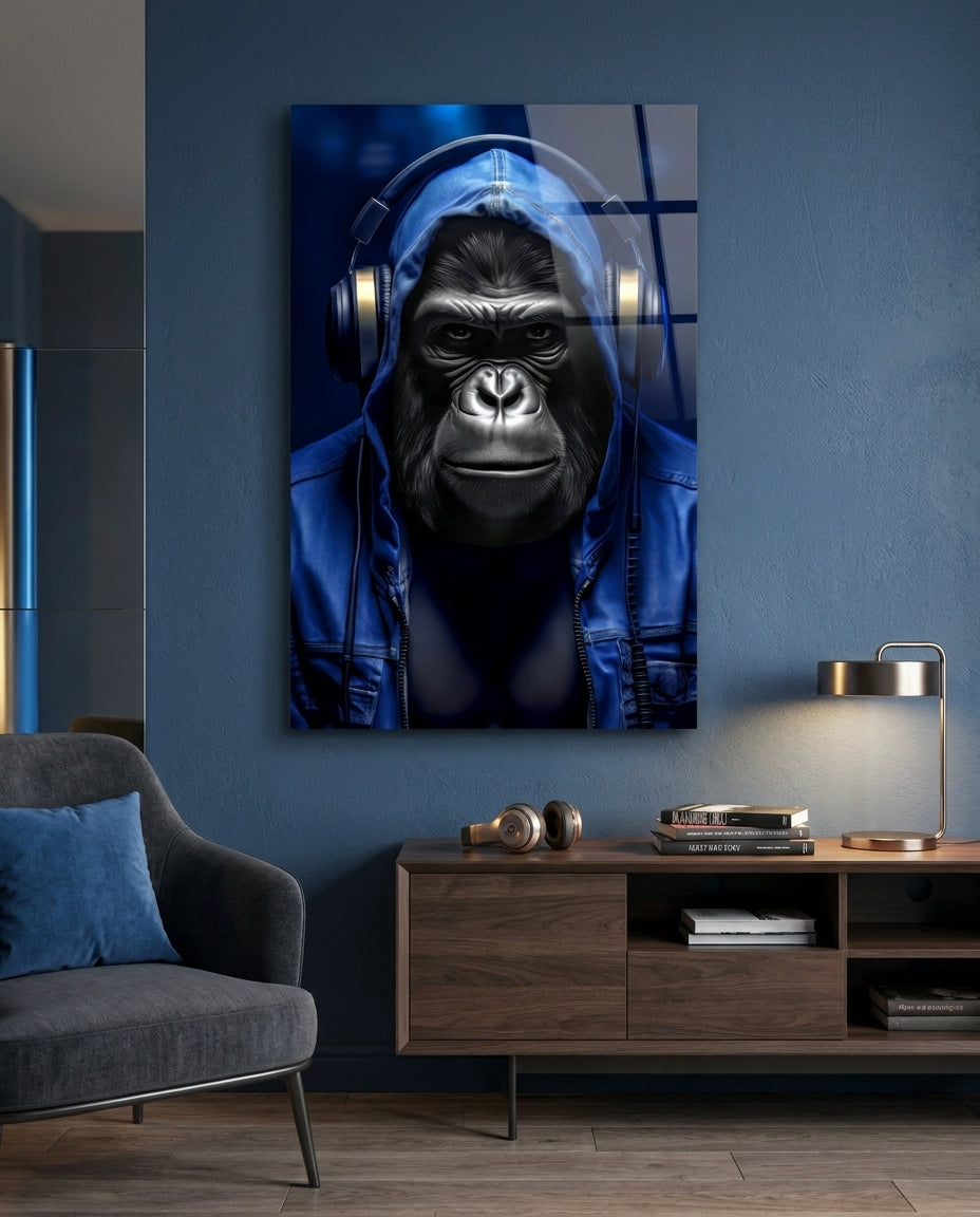 Blue hooded gorilla glass wall art on a blue wall above a wooden sideboard beside a gray armchair
