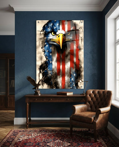 Bald eagle and flag glass wall art in a navy blue study above a wooden desk beside a tufted leather armchair