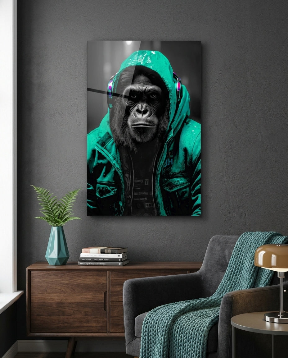 Turquoise rain hood gorilla glass wall art on a gray wall above a wooden sideboard and armchair