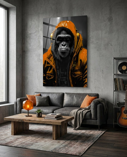 Orange rain hood gorilla glass wall art above a gray sofa and wooden coffee table