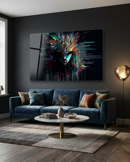 Mask-like face bursting into rainbow streaks on black, glass wall art above a navy velvet sofa