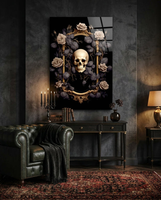 Gothic skull in gilded mirror glass wall art above a dark console with candles and a green leather sofa on a red rug