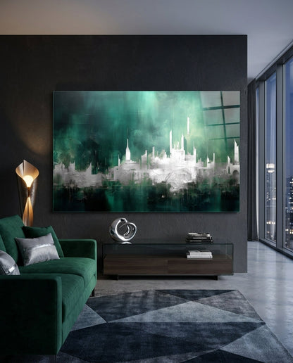 Emerald mist abstract skyline glass wall art above a low sideboard beside a green velvet sofa