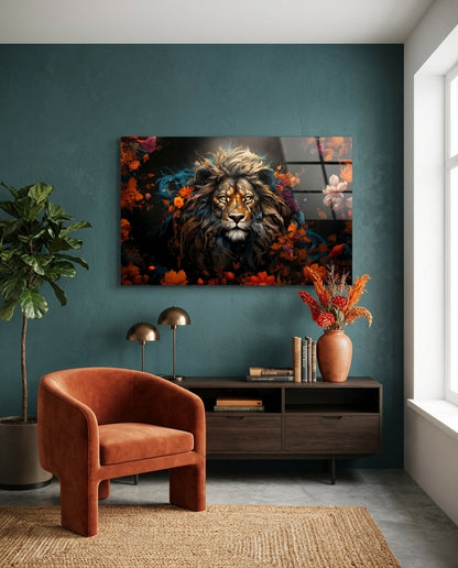 Lion among orange flowers glass wall art on a teal wall above a rust armchair and a dark wood console