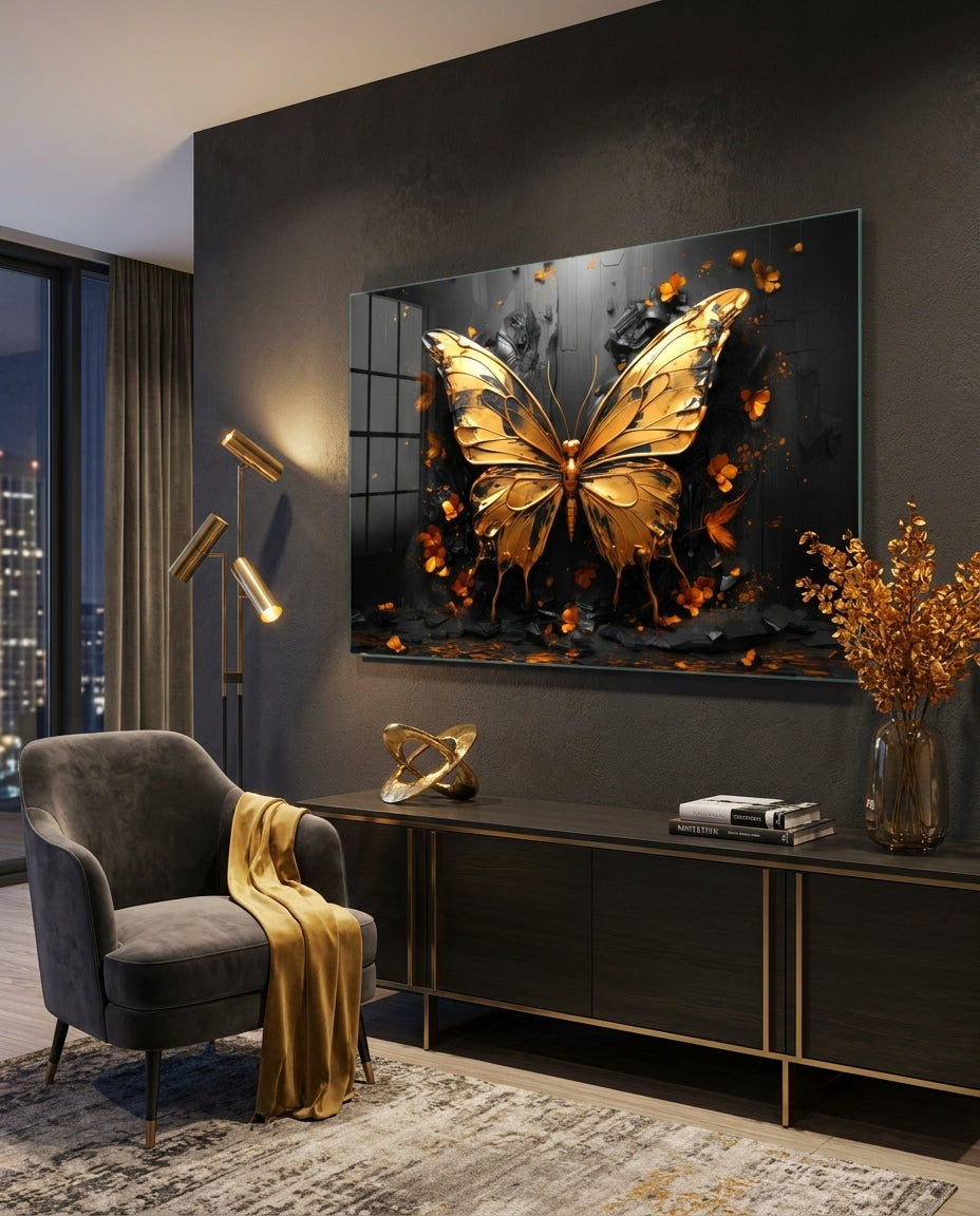 Golden butterfly glass wall art on a dark wall above a black console beside a gray armchair