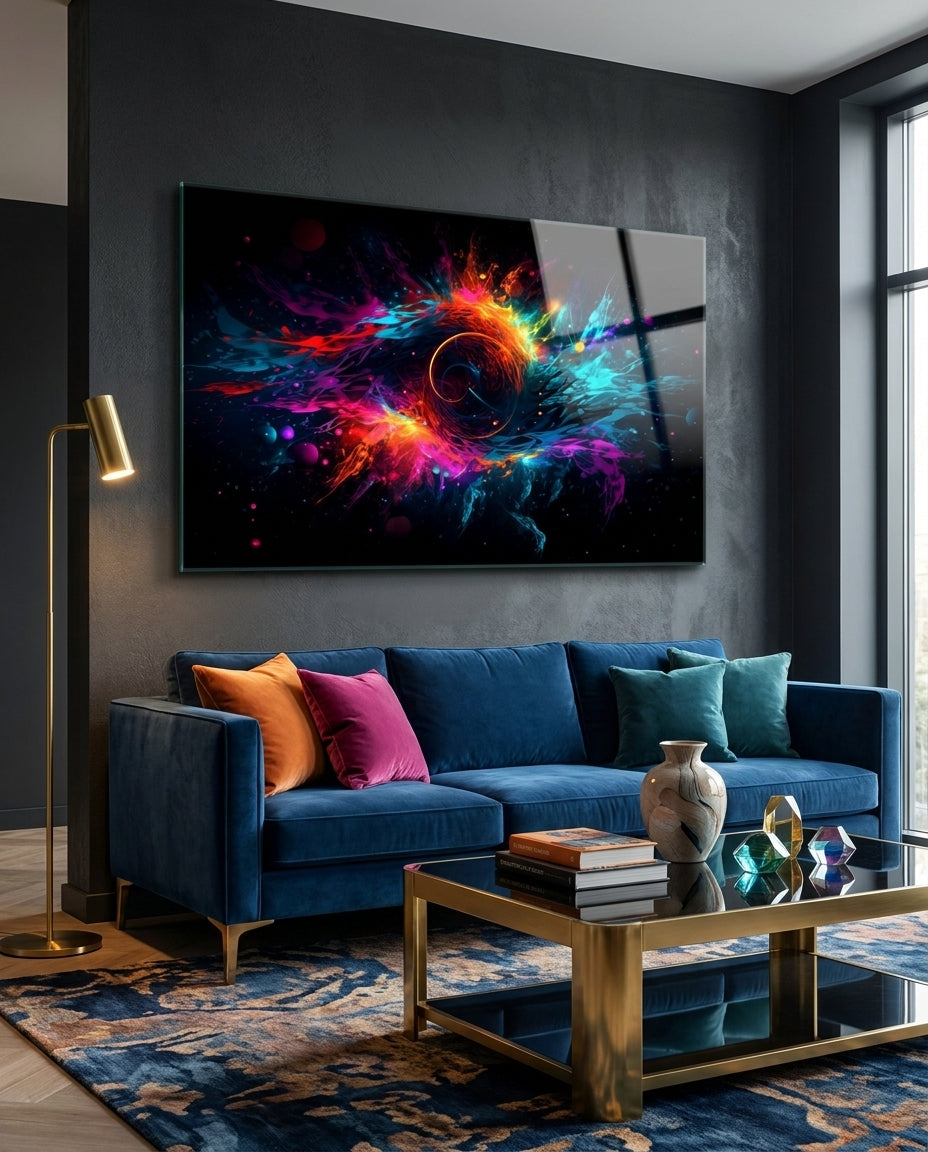 Neon cosmic vortex abstract glass wall art above a navy velvet sofa and brass coffee table on a dark wall