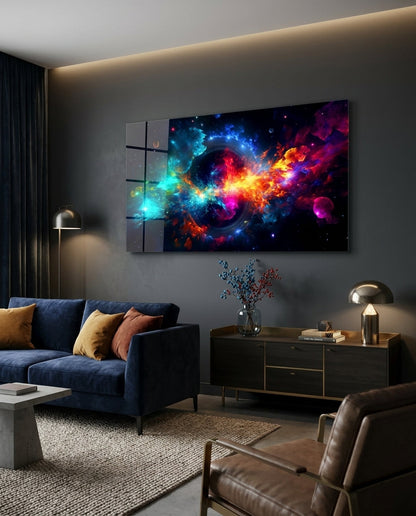 Rainbow nebula black hole glass wall art above a dark sideboard beside a navy sofa with mustard cushions