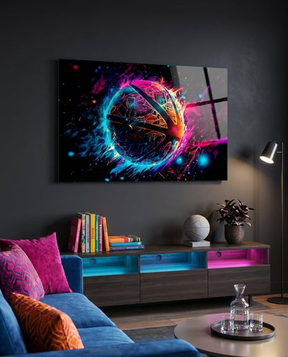 Cosmic fire sphere glass wall art above a blue sofa with pink cushions and a glowing low cabinet