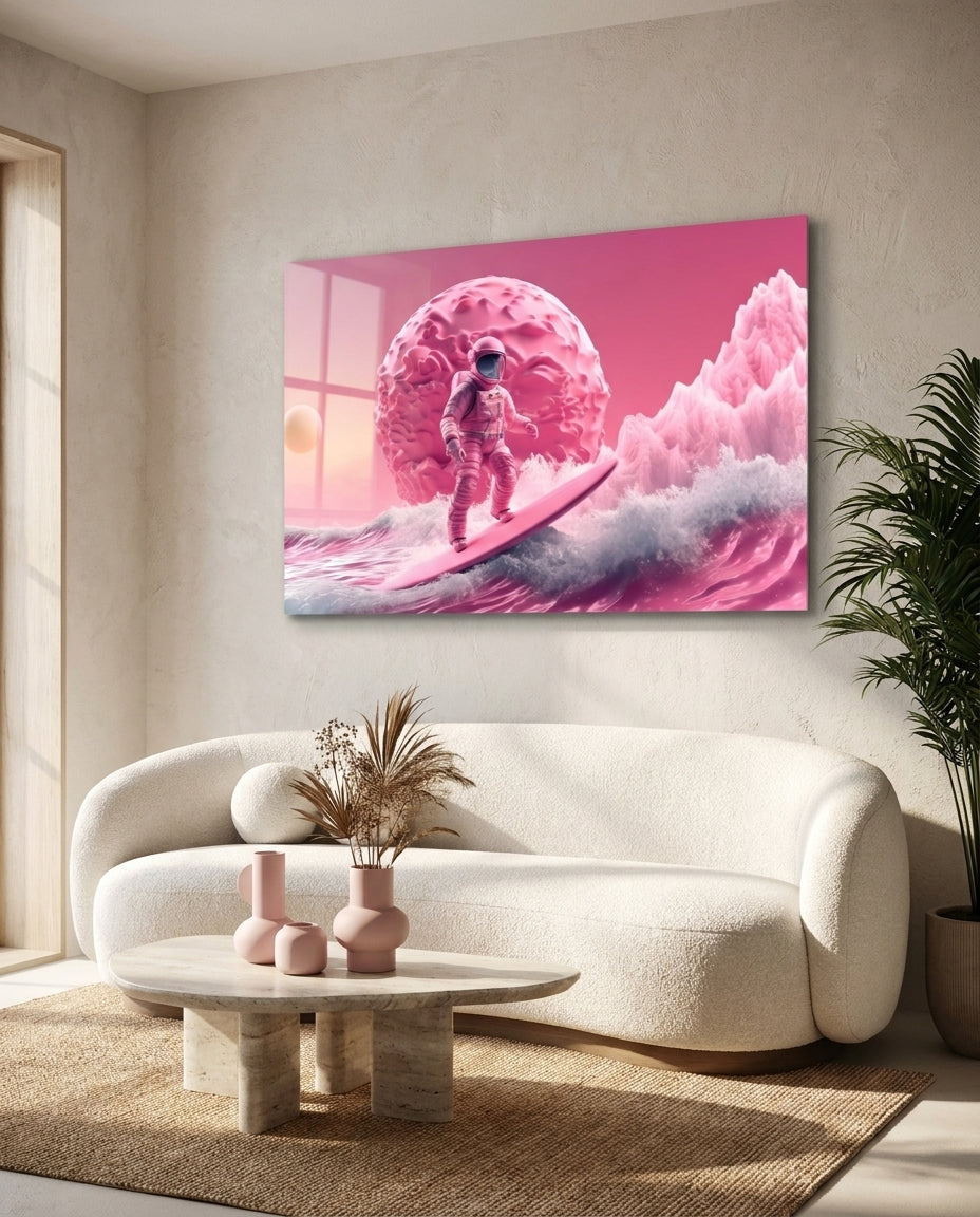 Astronaut surfing a pink wave glass wall art above a curved cream boucle sofa and round coffee table on a beige wall