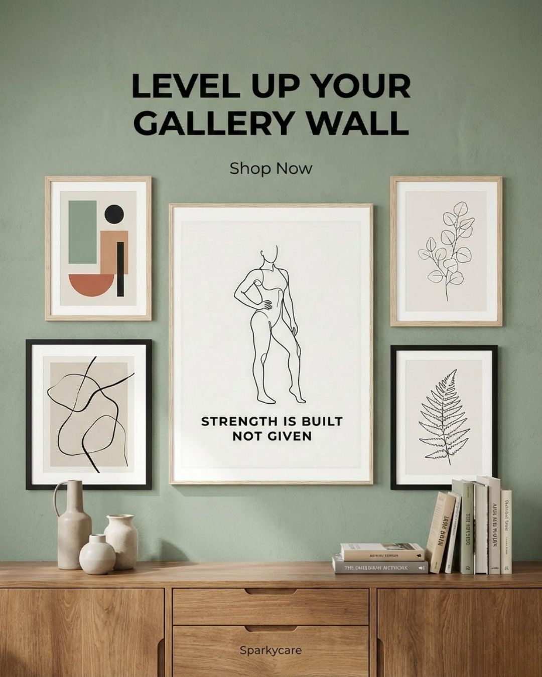 Decorative wall art on a green wall with text 'Level Up Your Gallery Wall' and 'Shop Now'.
