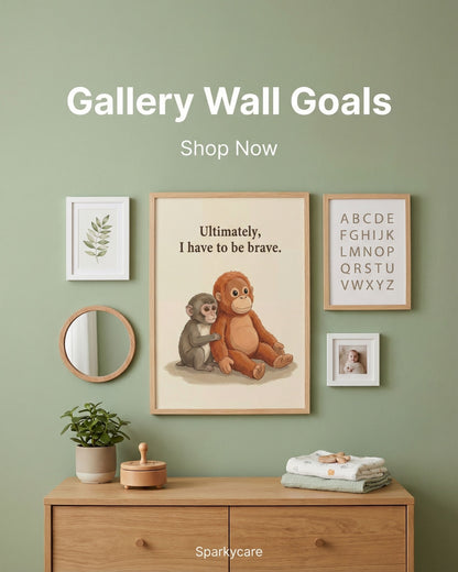 Decorative wall art with monkeys and text on a green wall with a wooden dresser.