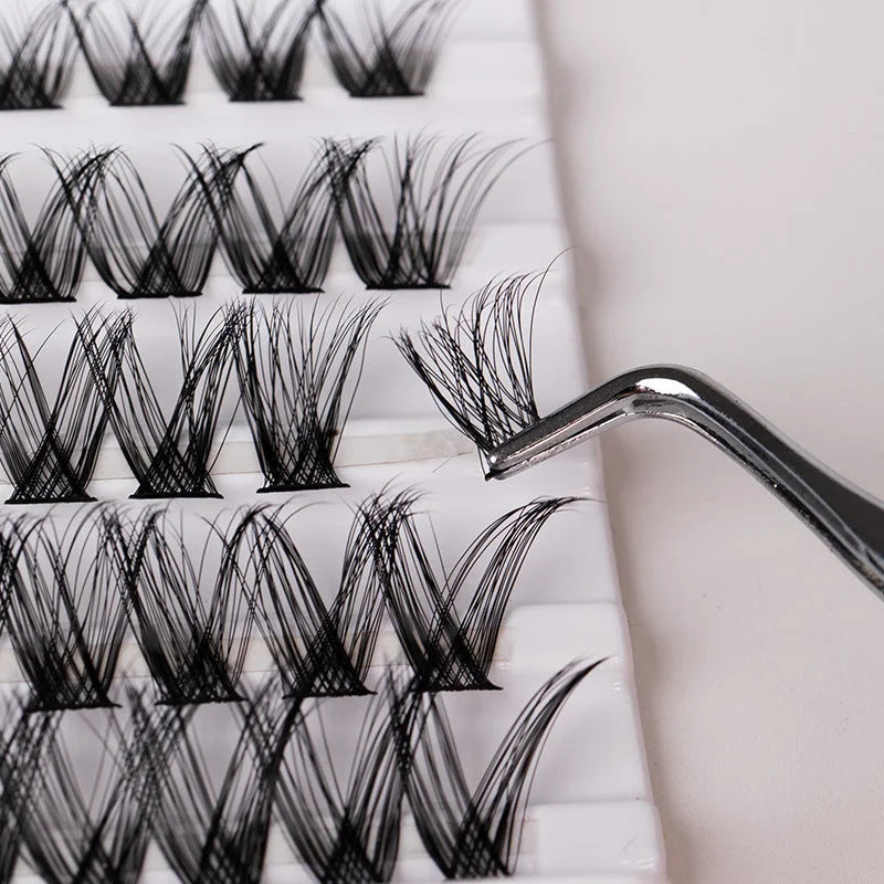 Detailed macro view of soft double headed lash clusters with natural curl and layered density
