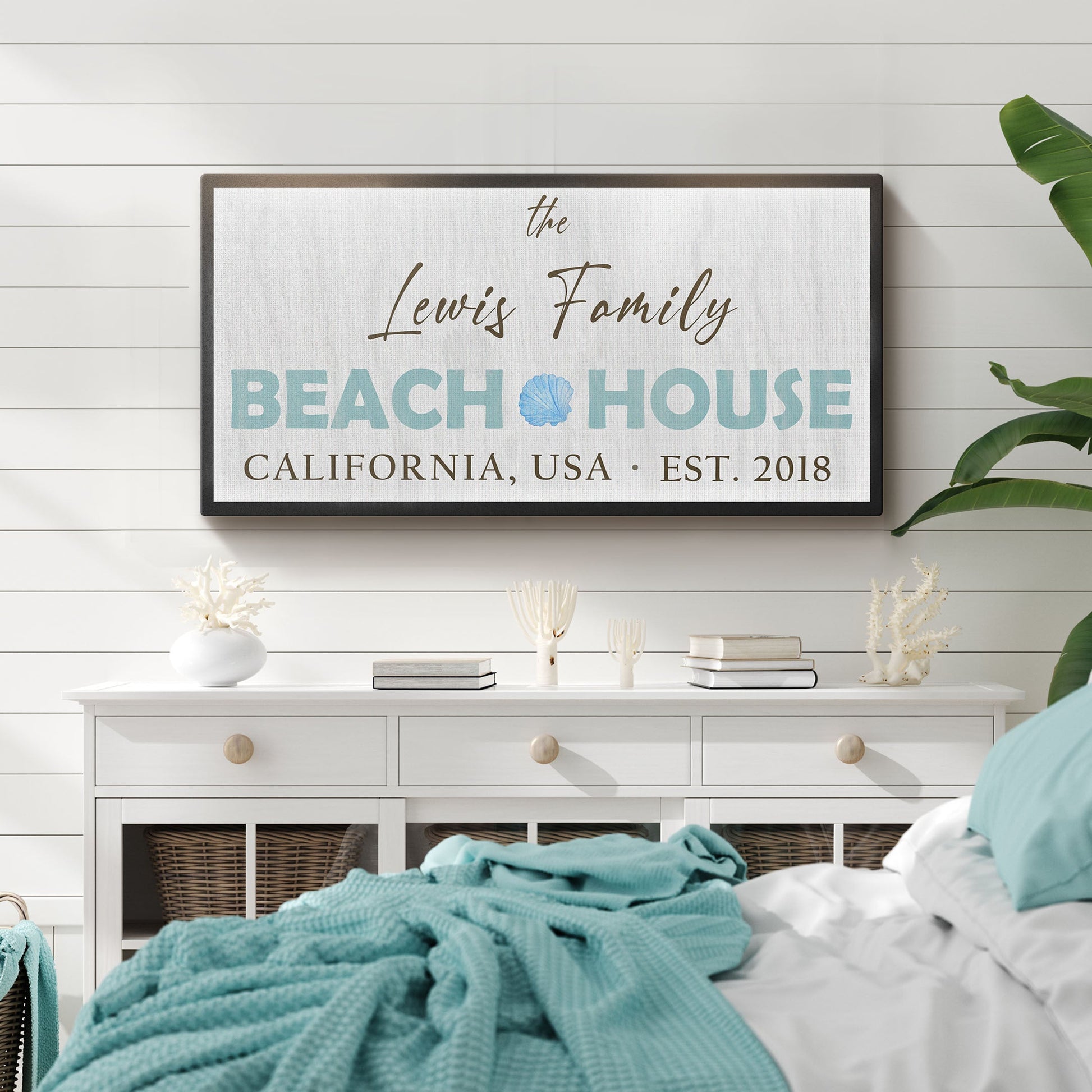 Beach House canvas wall art in a coastal sunroom
