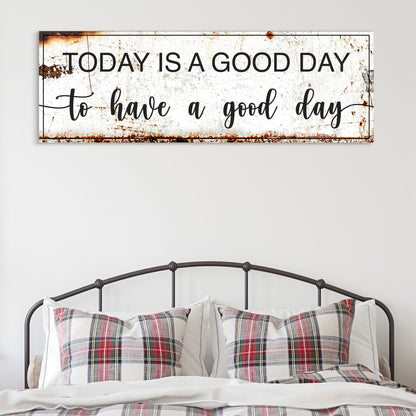 Today Is a Good Day rustic white canvas sign above an iron bed with plaid pillows