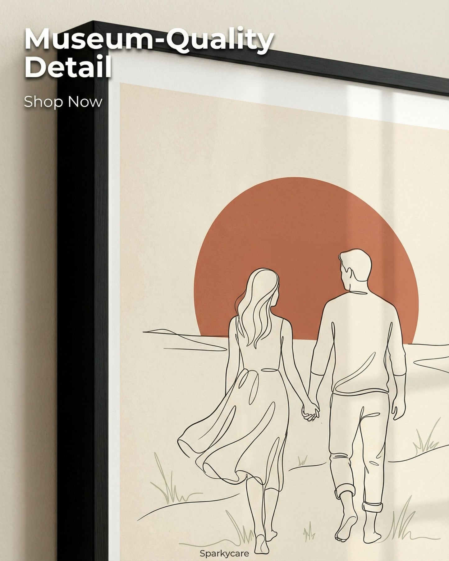 Framed artwork of a couple holding hands with a red sun in the background, labeled 'Museum-Quality Detail' by SparkyCare.