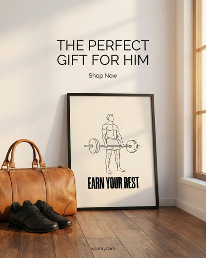 Framed artwork with 'Earn Your Rest' text on a wall next to a brown leather bag and black shoes.