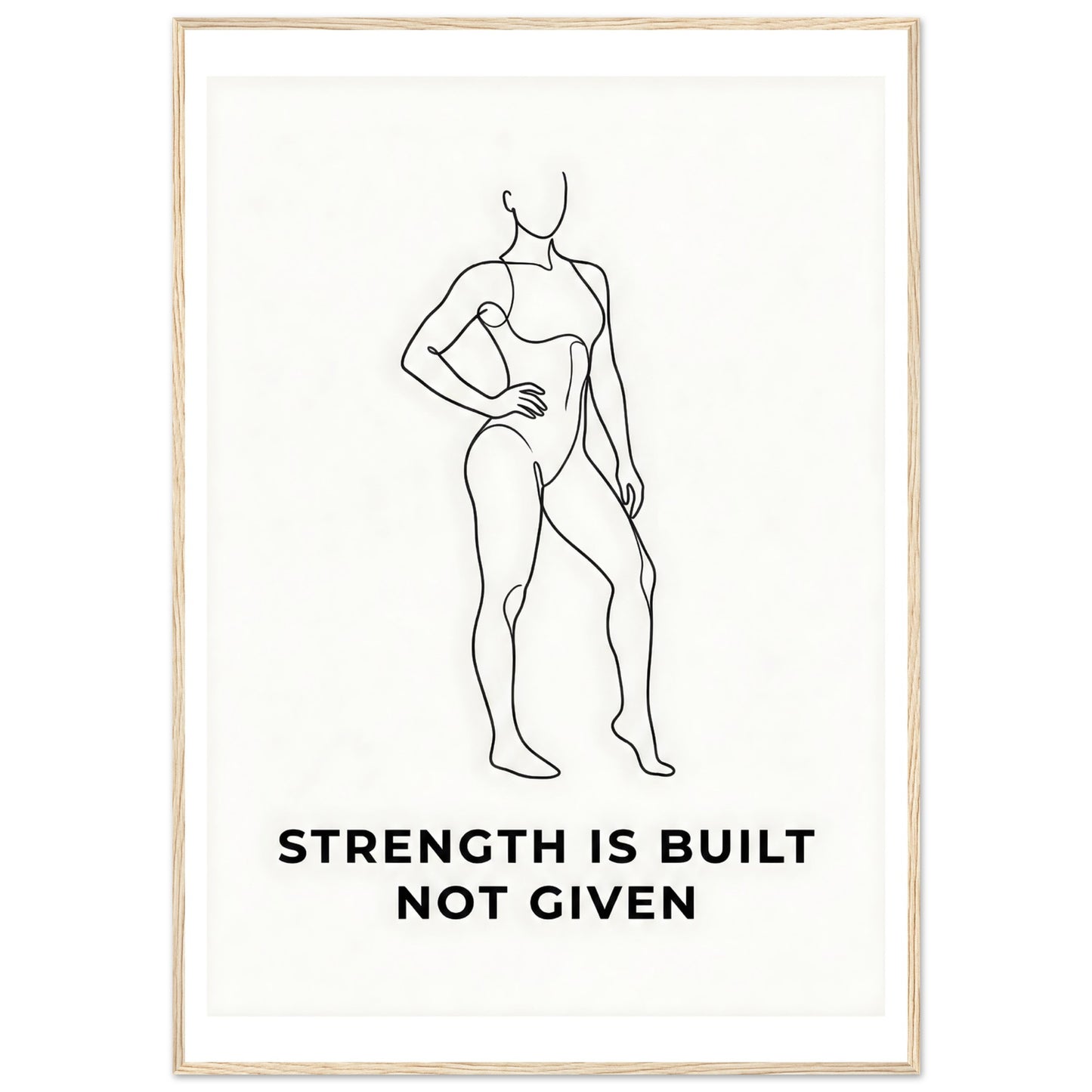 Framed poster with a black line drawing of a woman and the text 'Strength is built not given' on a white background.