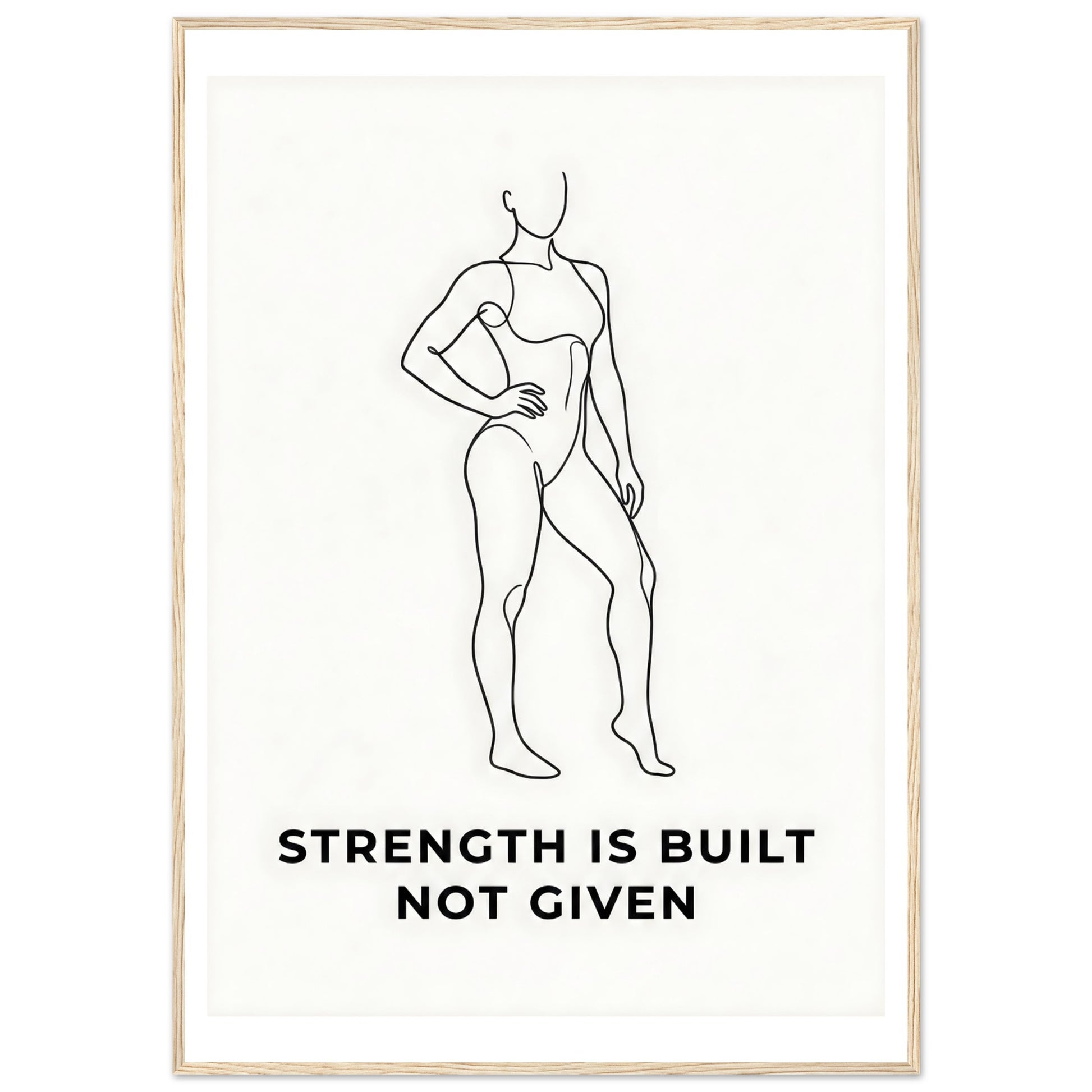 Framed poster with a black line drawing of a woman and the text 'Strength is built not given' on a white background.