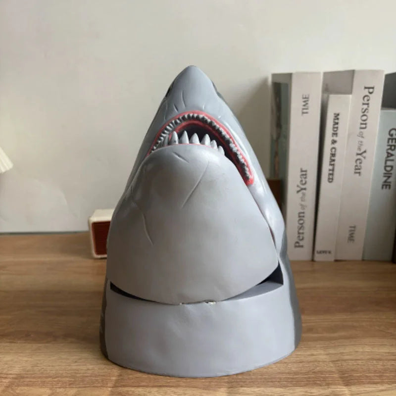 Front view of shark-shaped snack holder with realistic teeth details and wide opening for popcorn storage