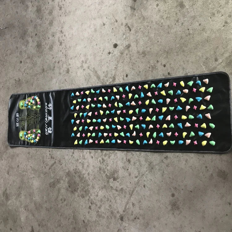 Full length reflexology foot massage mat with colorful textured stones for acupressure therapy